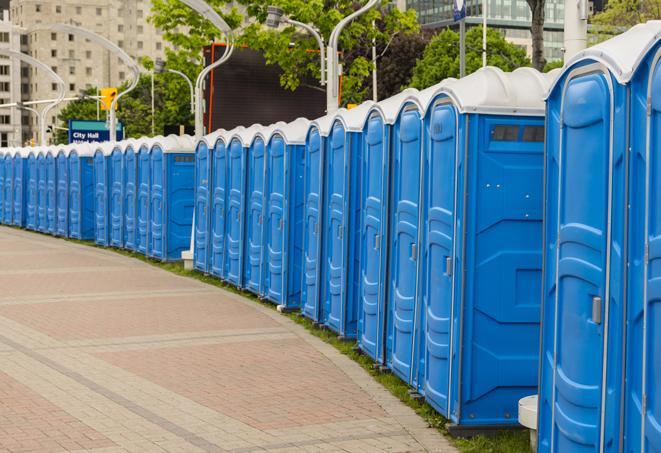 a row of portable restrooms at a fairground, offering visitors a clean and hassle-free experience in oilcity